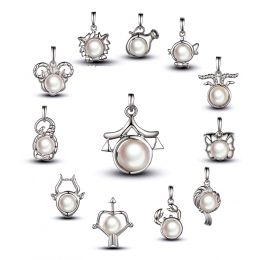 Pendentif Zodiaque. Perle Akoya, Or blanc 18cts