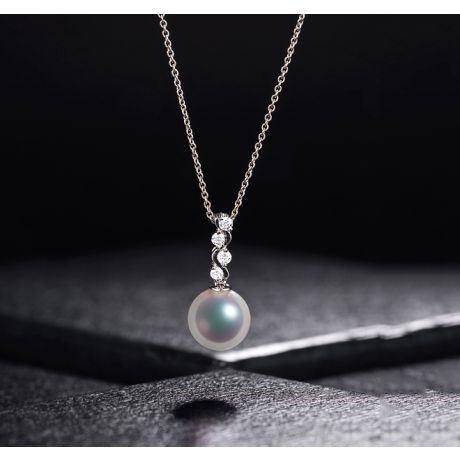 Pendentif danse du serpent. Perle Akoya, Or blanc, diamants.