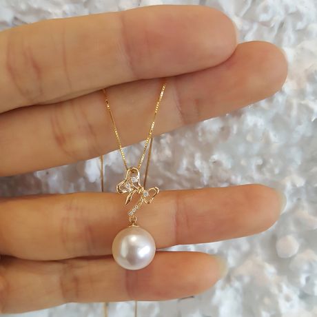 Pendentif noeud papillon or jaune - Perle eau douce blanche, diamant