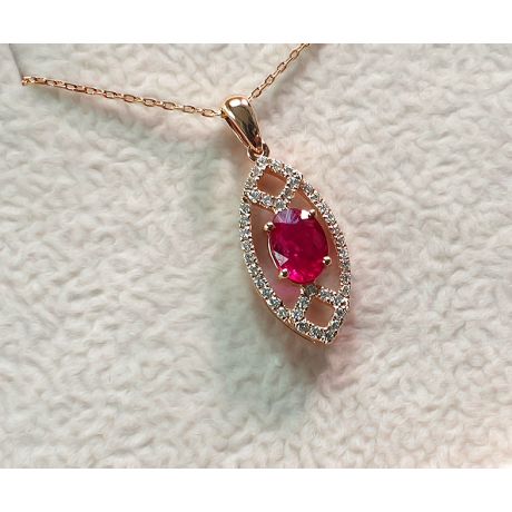 Pendentif ovalesque rubis or rose. Sertissage diamants 