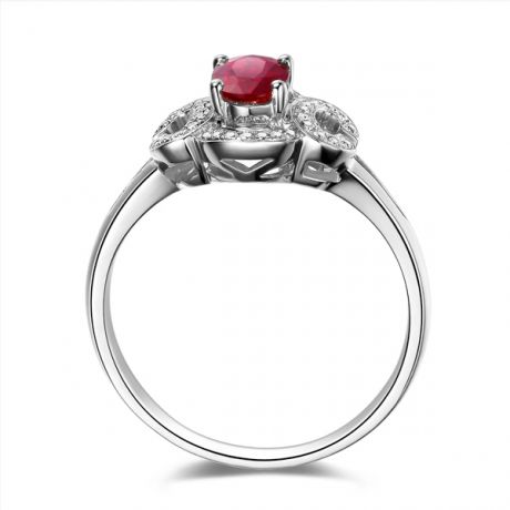 Bague de fiançailles en rubis diamants et or blanc. Motifs bouclés