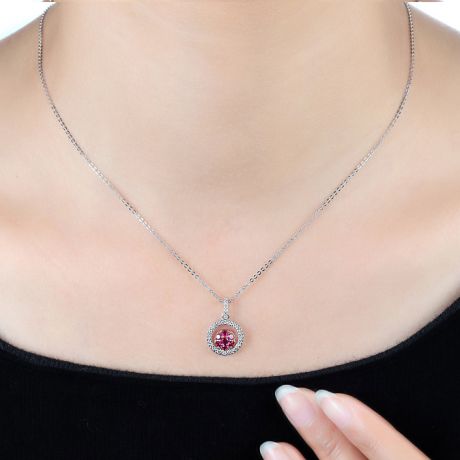 Pendentif rond en or blanc - Rubis et diamants en pendeloque double