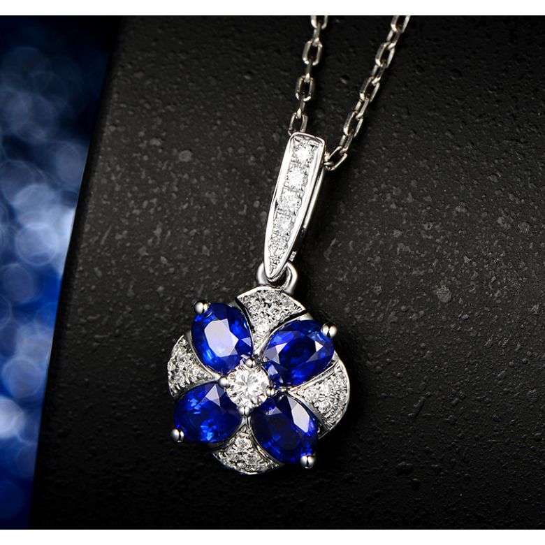 Pendentif solitaire fleur bleue. Or blanc, saphirs et diamants - 9