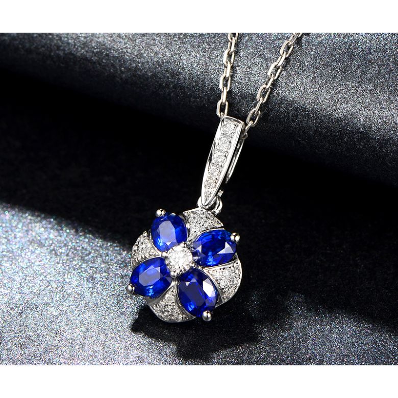 Pendentif solitaire fleur bleue. Or blanc, saphirs et diamants - 5